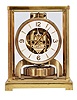 Jaeger- LeCoultre, Switzerland, "Atmos" clock, 15 jewel, caliber 526-5 movement, gilt torsion pendulum, round white painted dial with applied gilt Arabic numerals and arrow markers, gilt hands, all contained in a glazed rectangular case, movement serial #83424.