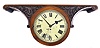 England, double-sided gallery clock, 8 day, time only, spring-driven fusee movement in a carved walnut case with 11 inch painted metal dials on opposite sides, both with cream background and black Roman numerals, blued steel Paris style spade hands.