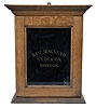 Eco Magneto Clock Co., Boston, Mass., circular dial time recorder, 8 day, time and recorder function for 4 watchman's stations, twin-spring Seth Thomas No. 10 balance wheel movement in an oak case with black glass and gold leaf reading "Eco Magneto Clock Co. / Boston".