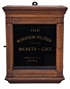 Munderloh and Co., Montreal, Canada, "Munderloh-Holtzer Magneto Clock", 8 day, time and recorder function for 6 watchman's stations, twin-spring balance wheel movement in an oak case with black glass and gold leaf lettering which reads in part "The Munderloh-Holtzer Magneto Clock / Holtzer's Patent".