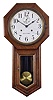 Clocks- 2 (Two): (1) Seth Thomas Clock Co., Thomaston, Conn., "World" wall hanging clock with a spring driven, 30 day timepiece movement in an oak case, c1917. (2) Ansonia Clock Co., New York, "Regulator A" hanging clock with a spring driven, 8 day, time and strike movement in a walnut case, c1900.