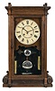 Seth Thomas Clock Co., Thomaston, Conn., "Lincoln V.P." shelf clock with a weight driven, 8 day, time and strike movement in a walnut case.
