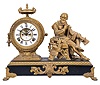 Ansonia Clock Co., New York, "Shakespeare" statue mantel clock with an 8 day spring driven time and strike movement with visible escapement in an enameled iron base with a bronzed spelter statue.