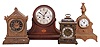 Clocks- 5 (Five): (1) Nicholas Mueller Sons, "Chapel", 8 day, time and strike, spring brass movement mantel clock, c1875 (2) Mitchell Vance & Co., New York, with a Seth Thomas' Sons & Co., New York, (No. 8025) movement, 15 day, time and strike, spring brass movement figural mantel clock, c1872, Mitchell Vance made the cases for S. Thomas & Sons. (3) English Watch & Clock Co., Coventry, England. Astral, 8 day, lever movement miniature English bracket clock, c1903 (4) Junghans, Germany, 8 day, time and strike, spring brass Westminster movement tambour shelf clock, c1900. (5) Ephraim Downes, Bristol Conn., pillar and scroll shelf clock, 30 hour, time and strike, weight driven movement in a mahogany and mahogany veneered case with painted wood dial.