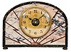 Bulle Clock, France, electro-mechanical mantel clock, time only, battery-powered movement in a variegated pink marble case with black marble border and bold lightning bold pattern, 5 inch brass dial with Arabic numerals and blued steel hands.