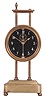 England, gravity clock, 30 hour, time only, weight driven movement with visible escapement and compound pendulum, in a brass case, glass dial with reverse painted Arabic figures, molded base on bun feet, hexagonal columns, and molded cornice with brass finials.