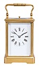 France, an unusual, five minute repeating carriage clock with single gong, gilt Corniche case with beveled glasses, Roman numeral white enamel dial, blued steel distaff hands, 8 day, time and strike movement with lever platform, counting the hours in passing, repeating the last hour when activated by top pusher, and repeating the last five minute interval through the pusher at case back