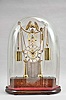 Auguste Moinau et Rolland Degrege, Paris, a good, two day, weight driven skeleton clock with thermometer, a pair of turned columns flanking the silvered thermometer scale, and supporting the well finished, pierced brass frames enclosing the four wheel train with recoil escapement, the back plate signed by the makers and with serial number 16, roman numeral silvered dial with blued steel Breguet style hands, brass clad weight and counterweights suspended from decorated ring link chain, and wound by pulling a cord, all surmounted by a gilt eagle resting on a silvered sphere, and resting on an oblong, inlaid, rosewood veneered base, and contained within a large glass dome with conforming, velvet lined socle