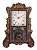 Brewster Manufacturing Co., Bristol, Conn., 8 day, time and strike, spring brass movement serpentine front shelf clock with gilt decoration.