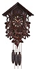 G. G. Berger, Germany, cuckoo and quail wall clock, 30 hour, time and bell strike with animated cuckoo and quail which calls on the quarters, three weight brass movement in a wood case featuring foliage, grapes, and a fox carved below the dial, painted wood cuckoo and quail birds with articulated beaks and wings, the dial with bone hands.