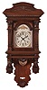 Gebrueder Wilde, Villingen, Germany, large "freischwinger", 8 day, time and gong strike, spring driven movement in a walnut case with carved acanthus on the crest and interesting pilasters flanking the door glass, silvered dial with Arabic numerals and pierced blued steel hands.