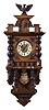 Clocks- 2 (Two) Becker Freischwingers: (1) Gustav Becker, Freiberg, Germany, freischwinger wall clock, 8 day, time and gong strike, spring driven movement in an walnut veneered Altdeutsch style case, c1890. (2) Kienzle, Schwenningen, Germany, freischwinger, 8 day, time and gong strike, spring driven movement in a walnut veneered Altdeutsch style case, c1910.