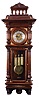 Clocks- 2 (Two) Vienna style wall clocks, Germany, 8 day, time and strike, weight driven in a walnut case: (1) Gustav Becker, grande sonnerie, three weight chiming with brass elements and engraving in frieze advertising for jeweler and clockmaker in Oldenburg, engraved dial center with matching pendulum and weights; (2) Unsigned, two weight in a burl case with ebonized trim