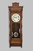 Waterbury Clock Co., Waterbury, Conn., "Regulator No. 4", 8 day, double weight driven brass movement wall timepiece. This case was also used by Welch for their "Regulator G" model. Although unmarked, this one an A- frame movement similar to the solid plate A-frame movements used in some other Waterbury regulators.