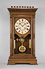 Seth Thomas Clock Co., Thomaston, Conn., "Garfield" shelf clock with a weight driven, 8 day, time and strike movement with cathedral gong in a cherry case.