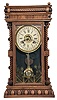 William L. Gilbert Clock Co., Winsted, Conn., "Elberon" 8 day, time and strike, spring brass movement shelf clock clock. This example has a simple calendar rather than Mc Cabe's Patent calendar mechanism.