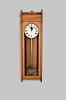 E. Howard & Co., Boston, Mass., "No. 89 Regulator", wall clock, 8 day, time only, weight driven movement with damascened pendulum disc in an oak case with a painted zinc dial