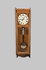 Seth Thomas Clock Co., Thomaston, Conn., "Regulator No. 17", wall clock, 8 day, time only, brass weight driven movement in an oak case with a painted metal dial