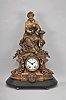 Seth Thomas Sons & Co., New York, "8029" shelf clock with a spring driven 15 day time and half hour strike movement in a bronzed finish spelter case.