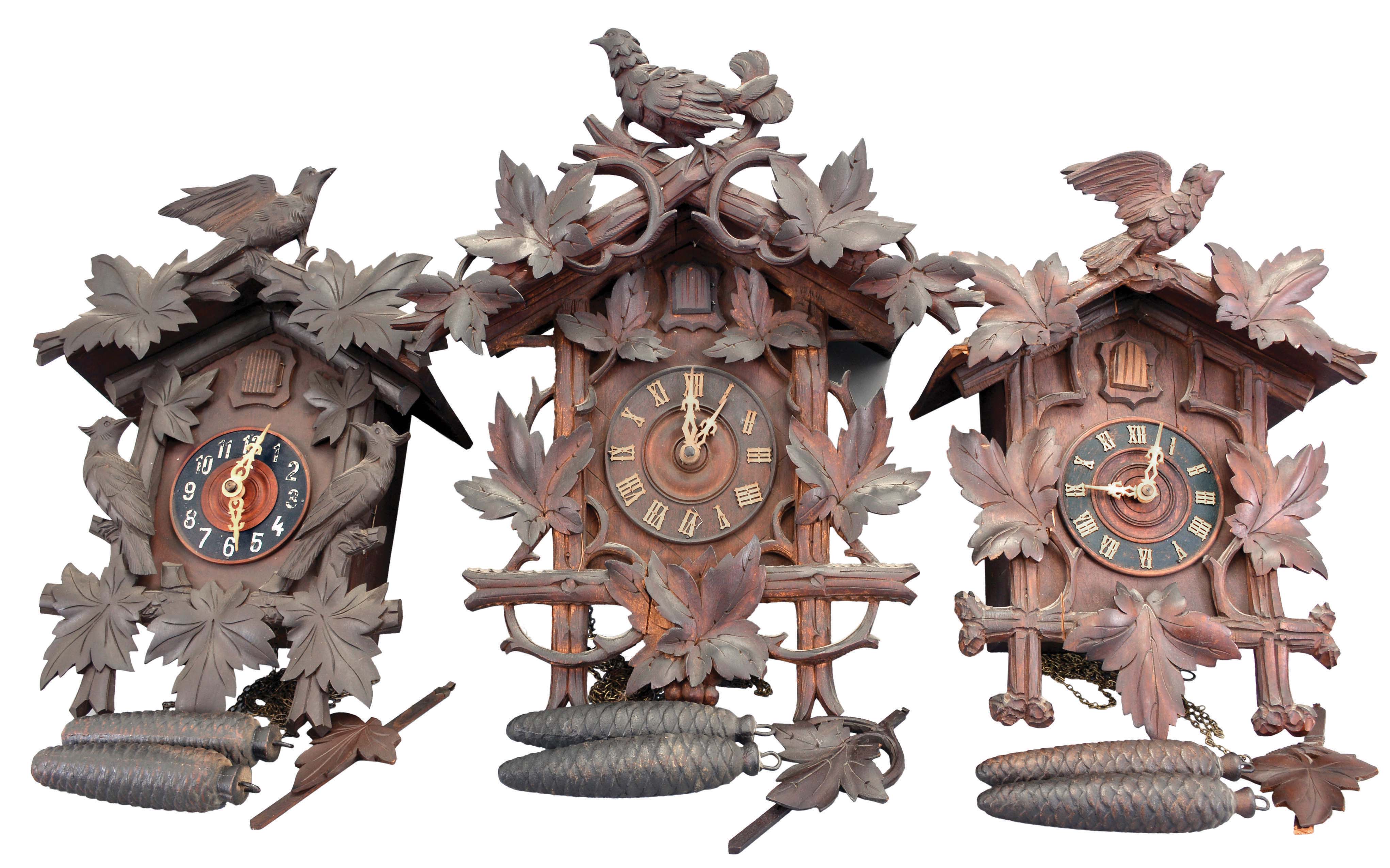 Clocks- 10 (Ten) German Cuckoo: most 30 hour, weight driven movemnts with 5 small modern cuckoos, and 5 vintage or antique cuckoos. One is a cuckoo and quail, and one has a rear label by The Swiss Clock Company, New York. — Antique Clocks Price Guide