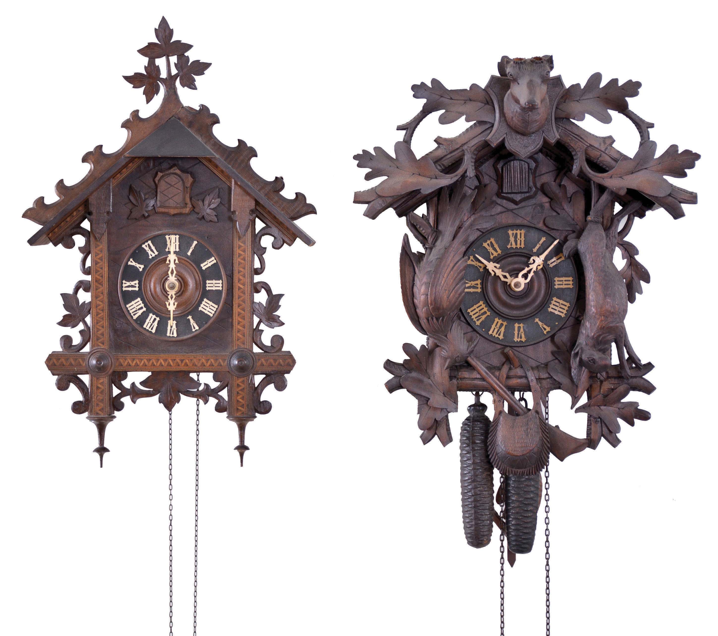 Clocks- 6 (Six) German Cuckoo: Assortment of Black Forest cuckoo clocks including 3 two-weight clocks and 3 three-weight cuckoo and quail clocks. Makers include: G.G.B., American Cuckoo Clock Co., and others which are not signed. — Antique Clocks Price Guide