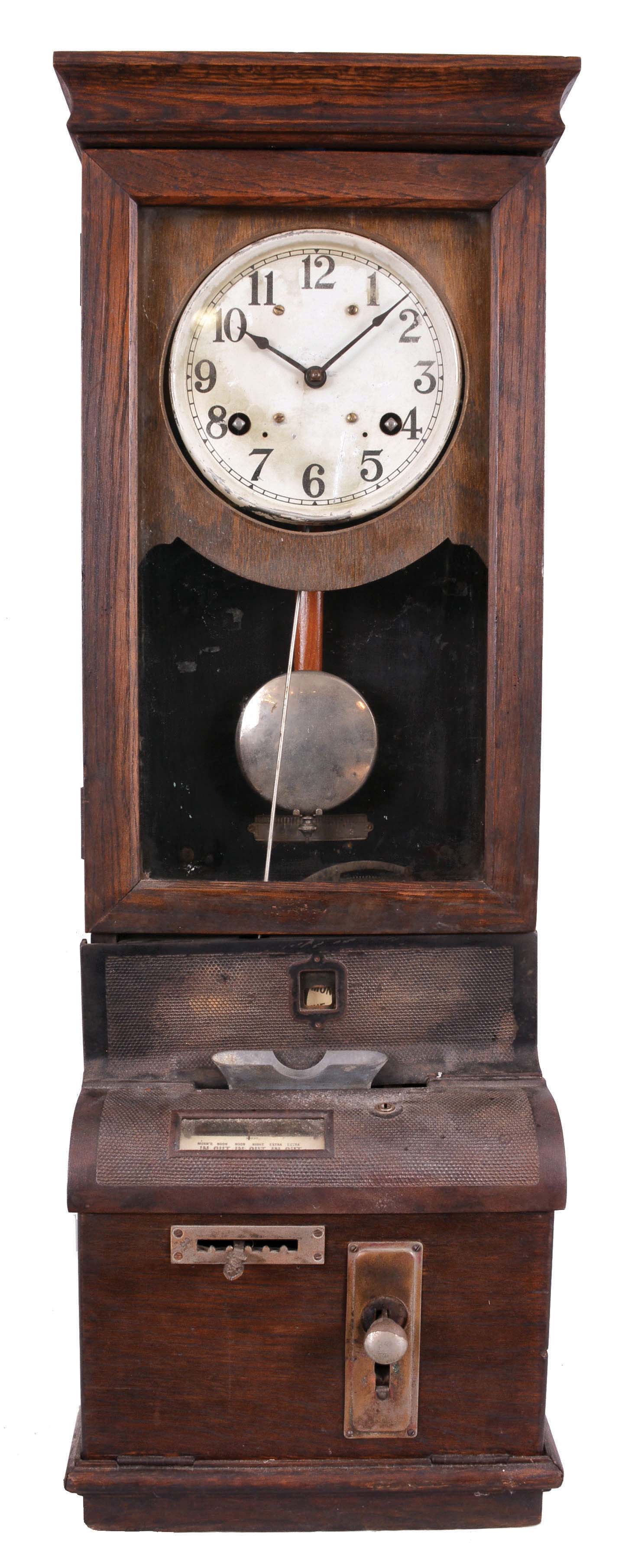 Clocks- 3 (Three) Time Recorders: (1) International Time Recording Co., Endicott, New York, time recorder, 8 day, time and punch card, twin spring movement in an oak case with signed metal dial. (2) Probably International Time Recording Co., Endicott, New York, time recorder, 8 day, time and punch card, twin spring movement in a dark oak case. (3) Cincinnati Time Recorder Co., Cincinnati Ohio, punch card mechanism only in a dark oak case. — Antique Clocks Price Guide