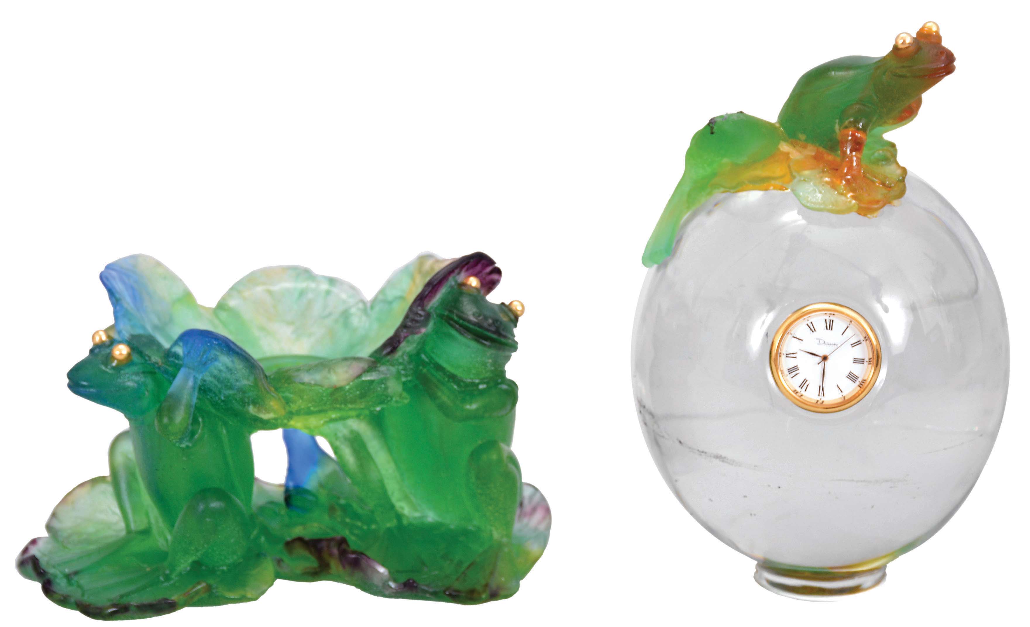 Clocks- 3 (Three): two Bulova "Accutron", both with cal. 214 movements and gilt metal cases, the other a Daum "Frog with Golden Eyes", green glass base with two frogs supporting a transparent glass ovate "case", set with a small quartz timepiece, and surmounted by another green glass frog — Antique Clocks Price Guide