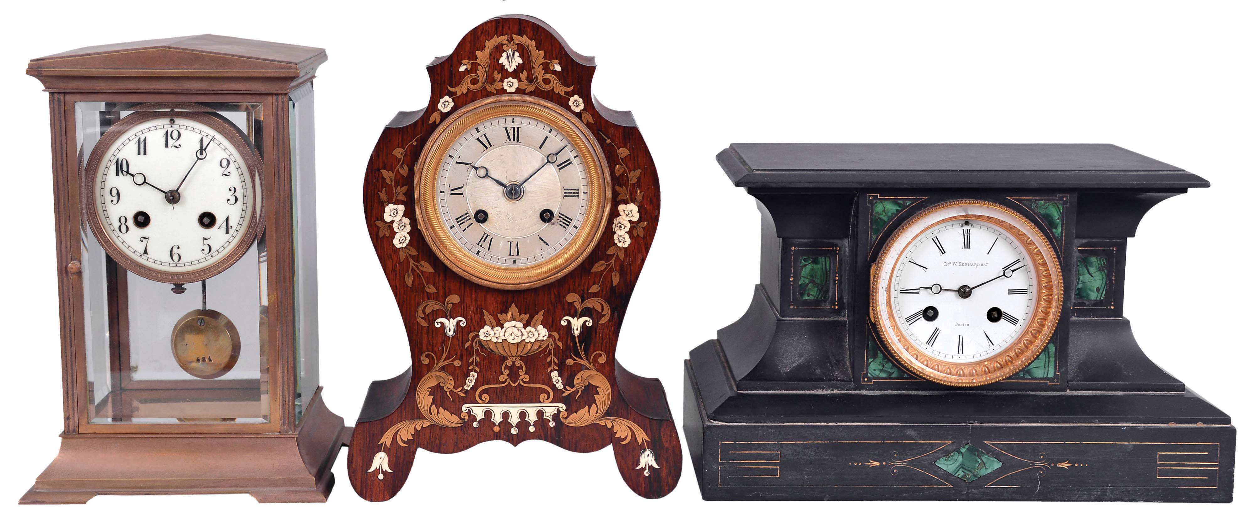 Clocks- 3 (Three) French Mantel Clocks: (1) W.B. Promoli, Paris, mantel clock, 8 day, time and strike, spring-driven movement with silk thread suspension in a rosewood case with floral boulle work, the engine turned silvered dial is signed by the maker; (2) S. Marti et Cie., Paris, crystal regulator, 8 day, time and strike, spring-driven movement in a brass and glass case with white porcelain dial; (3) S. Marti et Cie., Paris for Chas. W. Kennard &amp; Co., Boston, mantel clock, 8 day, time and strike, spring-driven pendule de Paris movement in a black slate case with green malachite insets and white enamel dial. — Antique Clocks Price Guide