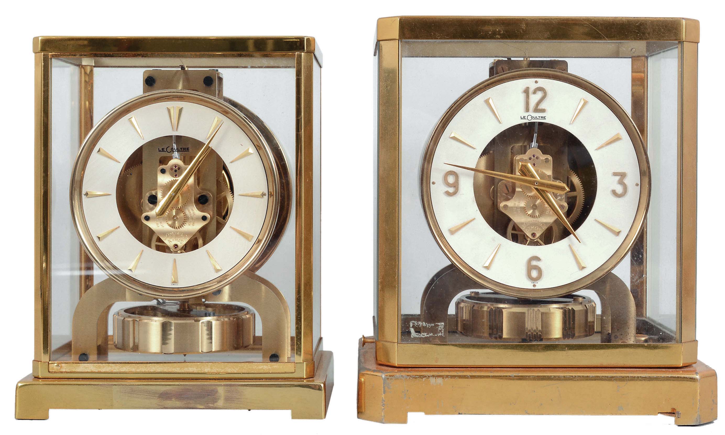 Clocks- 2 (Two) Atmos: (1) Jaeger-LeCoultre, Switzerland, "Atmos" clock, 15 jewel, caliber 526-5 movement, torsion pendulum, round metal dial with applied gilt arrow markers, gilt hands, all contained in a rectangular case with original cloth covered box, serial #83408, c1955; (2) Jaeger-LeCoultre, Switzerland, "Atmos" clock, 15 jewel movement, torsion pendulum, round metal dial with applied gilt numerals, arrow markers, and hands. — Antique Clocks Price Guide