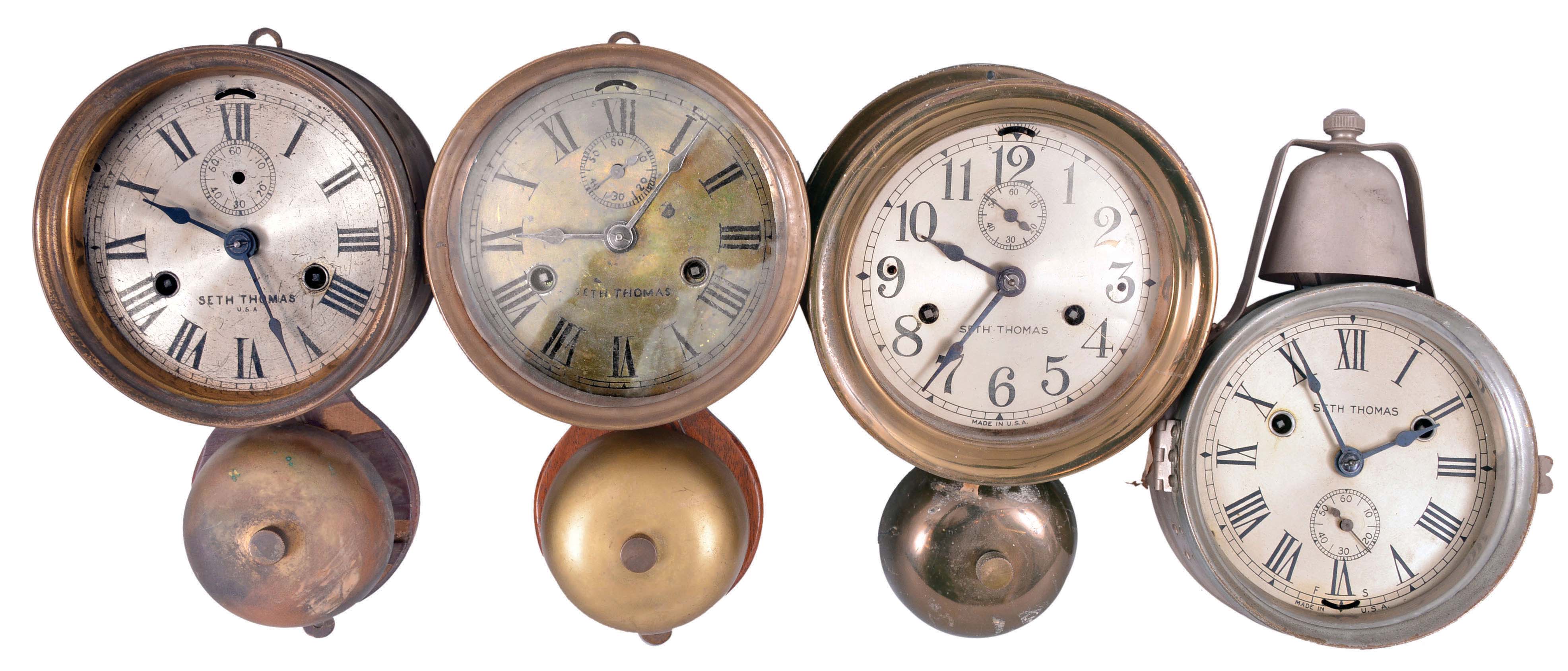 Clocks- 4 (Four) Seth Thomas Marine Clocks: two Seth Thomas Clock Co., "Ship's Bell" marine clocks, c1885, one "Monitor" c.1920, and one "Yacht Clock" c.1885, all 30 hour, time and ship's strike, spring-driven balance wheel movements in brass or nickel plated cases with hinged or bayonet bezels, silvered dials, and exterior bells. — Antique Clocks Price Guide