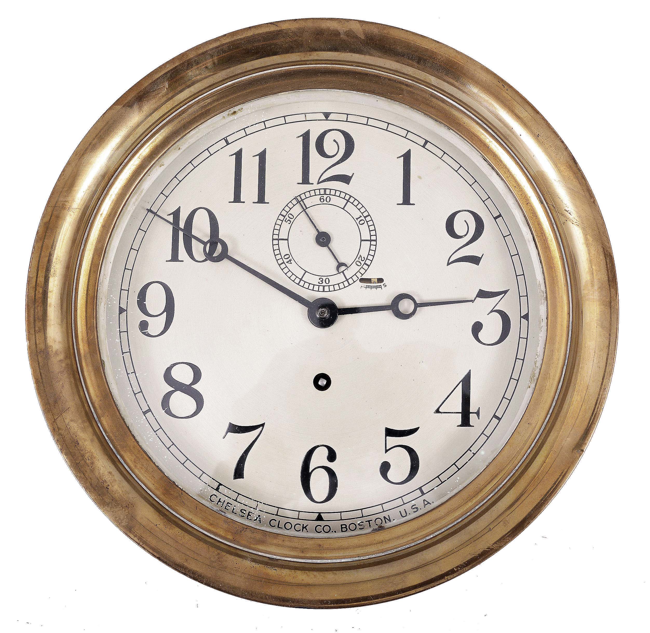 Chelsea Clock Co., Boston, Mass., for U.S. Navy, "Pilot House" timepiece, 8 day, time only, spring-driven rectangular movement in a polished brass case with 8.5 inch silvered dial and large subsidiary seconds above the center arbor, movement serial number 248815. — Antique Clocks Price Guide