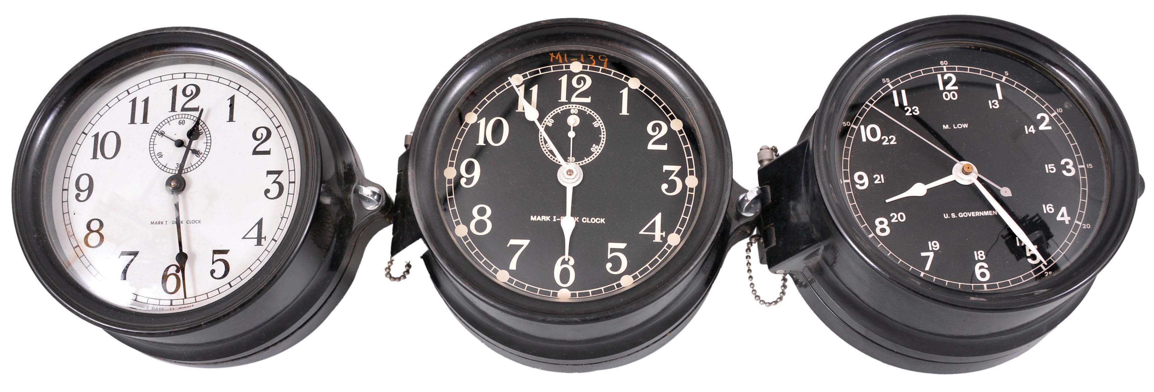 Clocks- 7 (Seven) Deck Clocks: M. Low, New York, "Mark I- Deck Clocks" and others, 8 day, time only, spring-driven balance wheel movement in black phenolic cases and one in nickel plated metal case, 6.5 inch black and white dials with subsidiary seconds, many with rear mounting plates. — Antique Clocks Price Guide