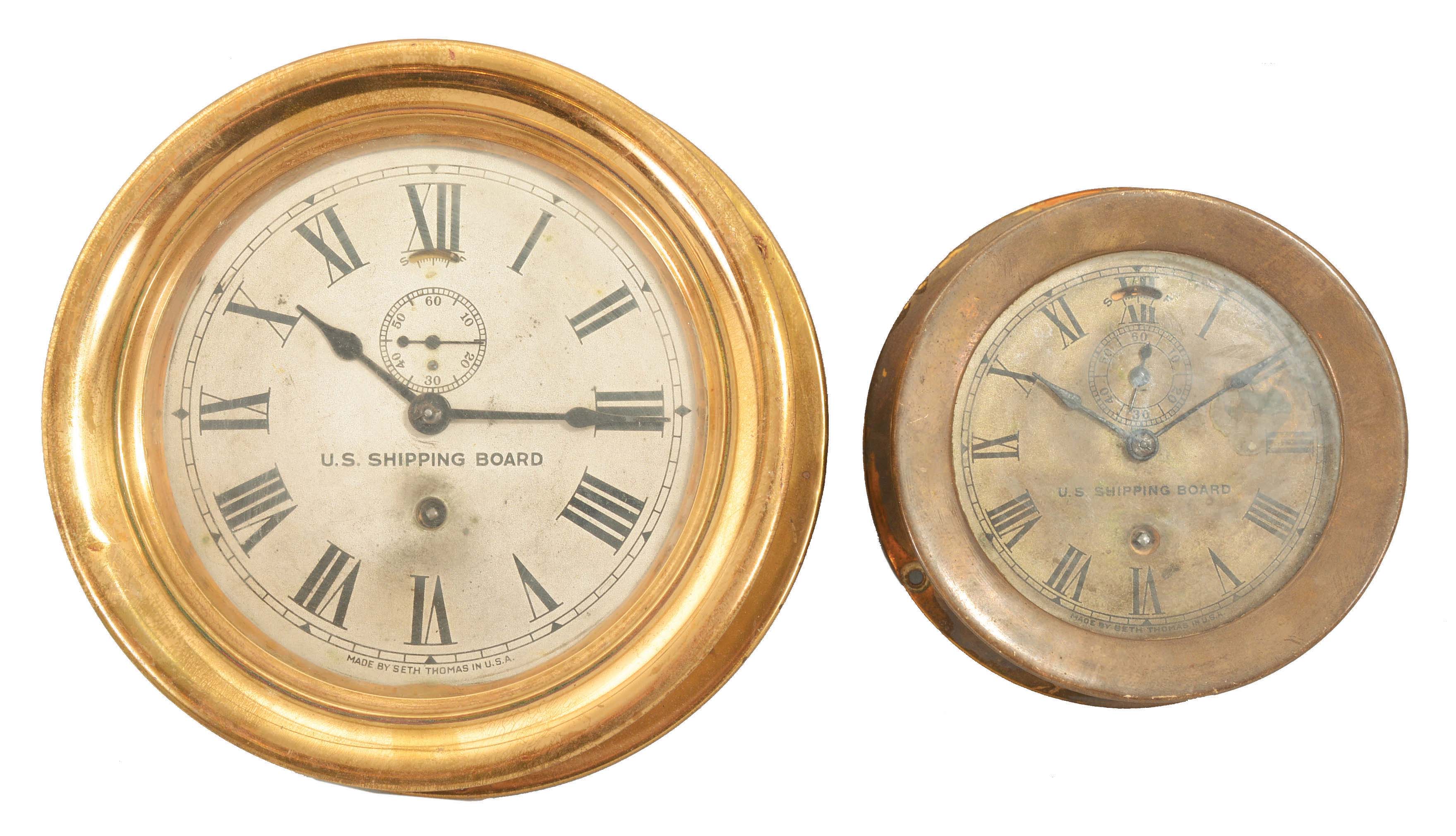 Clocks- 2 (Two) Seth Thomas Marine Clocks: Seth Thomas Clock Co., Thomaston, Conn., ship's lever marine clocks, 8 day, time only, spring-driven jeweled movements in brass cases, one with screw on bezel and one with a hinged bezel, 4 and 5 inch silvered dials with subsidiary seconds, both inscribed with "U.S. Shipping Board" below the center arbor, and both with blued steel spade hands. — Antique Clocks Price Guide