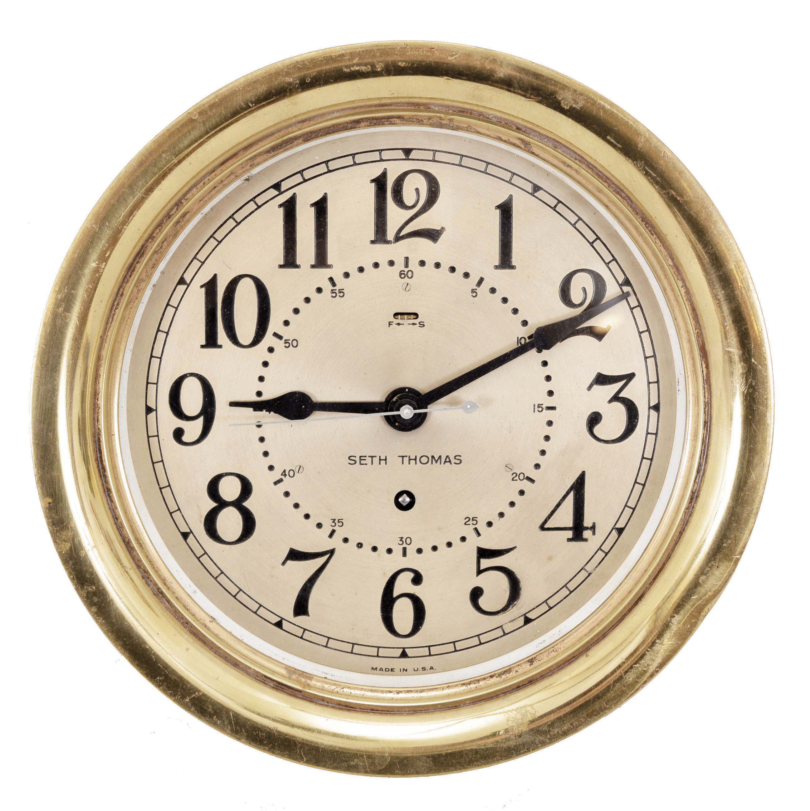 Seth Thomas Clock Co., Thomaston, Conn., "Corsair No. 8" ship's lever, 8 day, time only, spring-driven 11 jewel balance wheel movement with center seconds in a brass case with hinged bezel and hasp, 8 inch silvered dial with Arabic numerals, inner seconds track, and black spade hands. — Antique Clocks Price Guide
