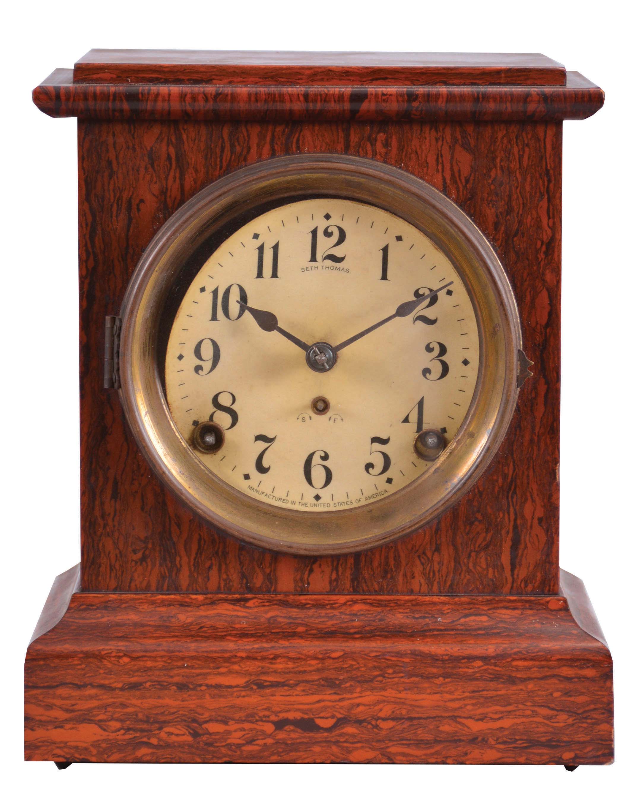 Seth Thomas Clock Co., Thomaston, Conn., "Dana No. 1" shelf clock with a spring driven, 8 day, time and strike movement in an adamantine finish case. — Antique Clocks Price Guide