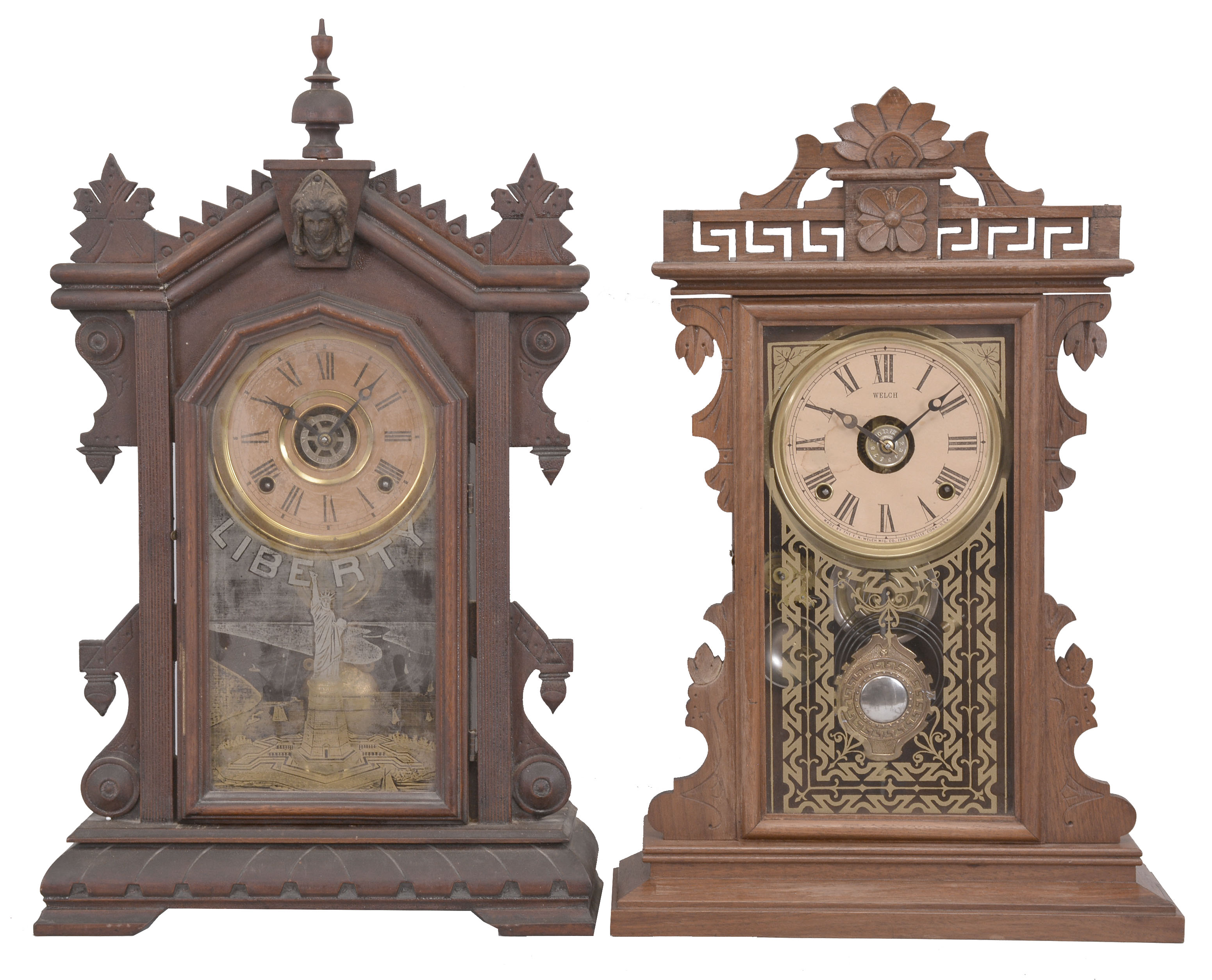 Clocks- 4 (Four): (1) E. Ingraham and Co. for Chas. F. Adams, "Liberty" mantel clock, 8 day, time and strike with alarm in a walnut case, c1890; (2) E.N. Welch, "Aida" mantel clock, 8 day, time and strike with alarm in a walnut case, c1884; (3) New Haven Clock Co., mantel clock, 8 day, time and strike with alarm in a walnut case, c1890. (4) Waterbury Clock Co., "Stanton" mantel clock, 8 day, time and strike in an oak case, c1906. — Antique Clocks Price Guide