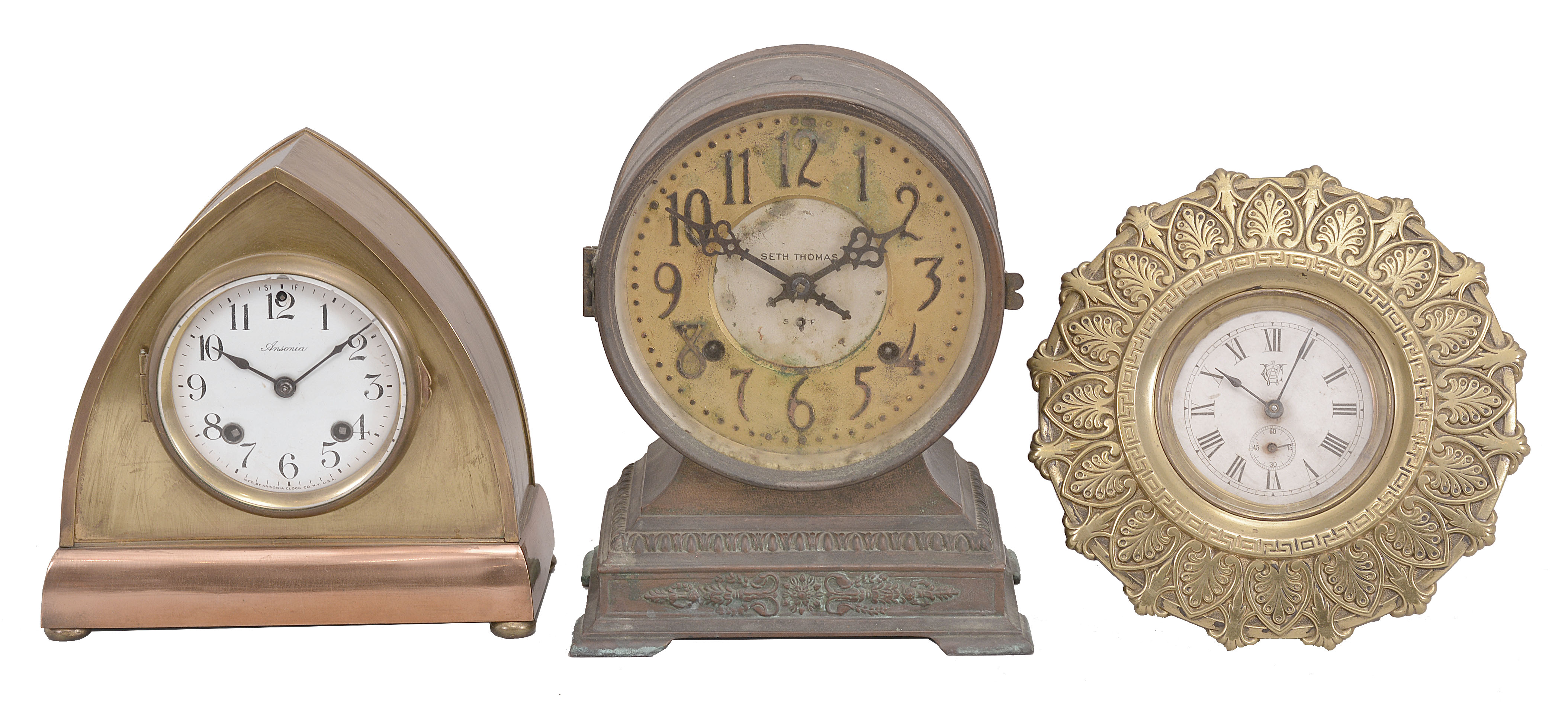 Clocks- 3 (Three): Ansonia Clock Co., NY, "Canterbury" mantel clock, 8 day, time and strike, spring driven movement in a brass case, c1917; (2) Seth Thomas Clock Co., "Elect" mantel clock, 8 day, time and strike, spring driven movement in a metal case, c1909; (3) Waterbury Clock Co., "General", 30 hour, time only, spring driven balance wheel movement with a cast brass case, c1888. — Antique Clocks Price Guide