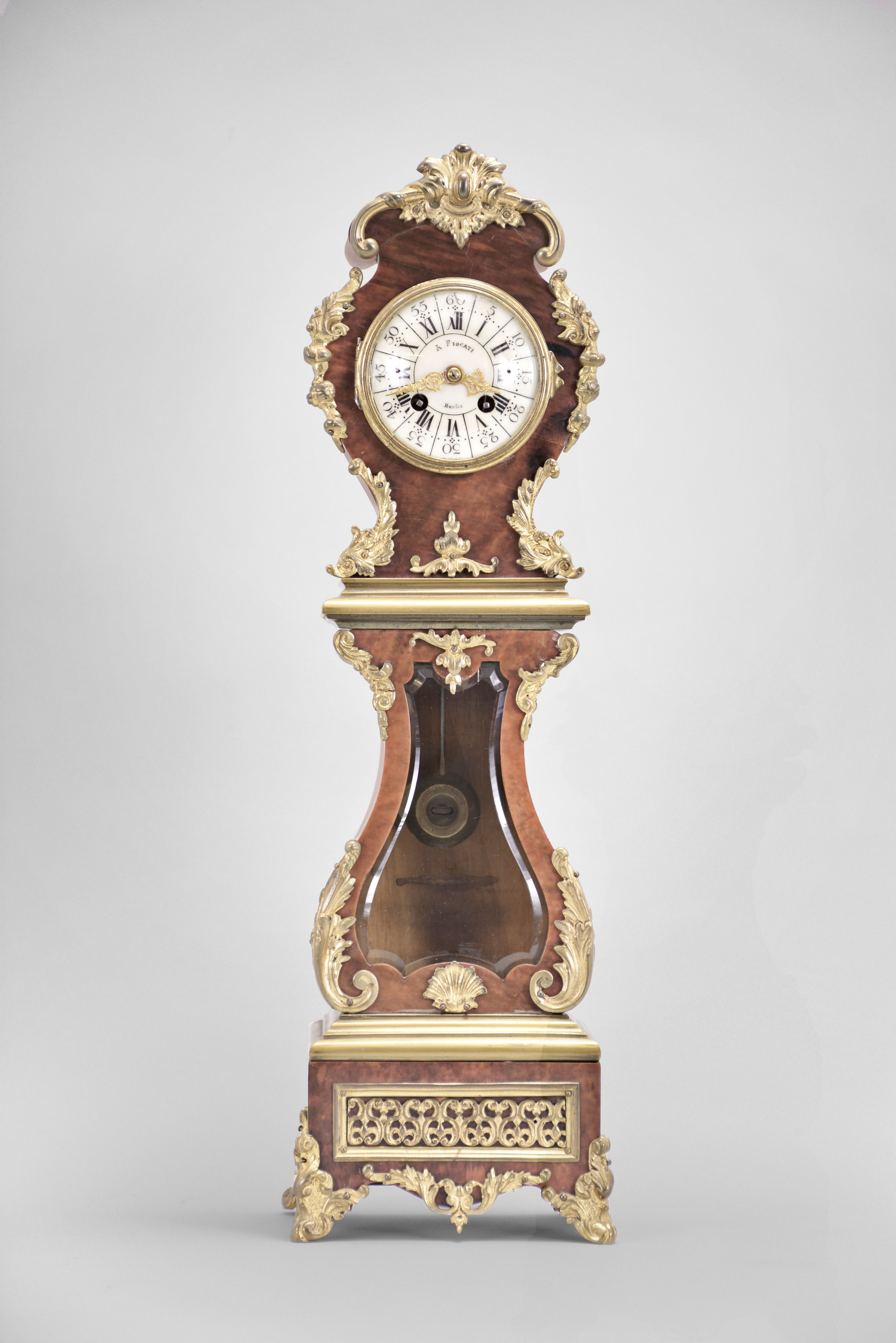 Vincenti &amp; Cie, Paris, France for A. Fiocati, Berlin, Germany, miniature tall clock, 8 day, time and strike, spring driven diminutive pendule de Paris movement in a lyre-form case with tortoise shell veneer and applied ormolu mounts, cream colored enamel dial with Roman and Arabic numerals, and gilt Louis XV style hands. — Antique Clocks Price Guide