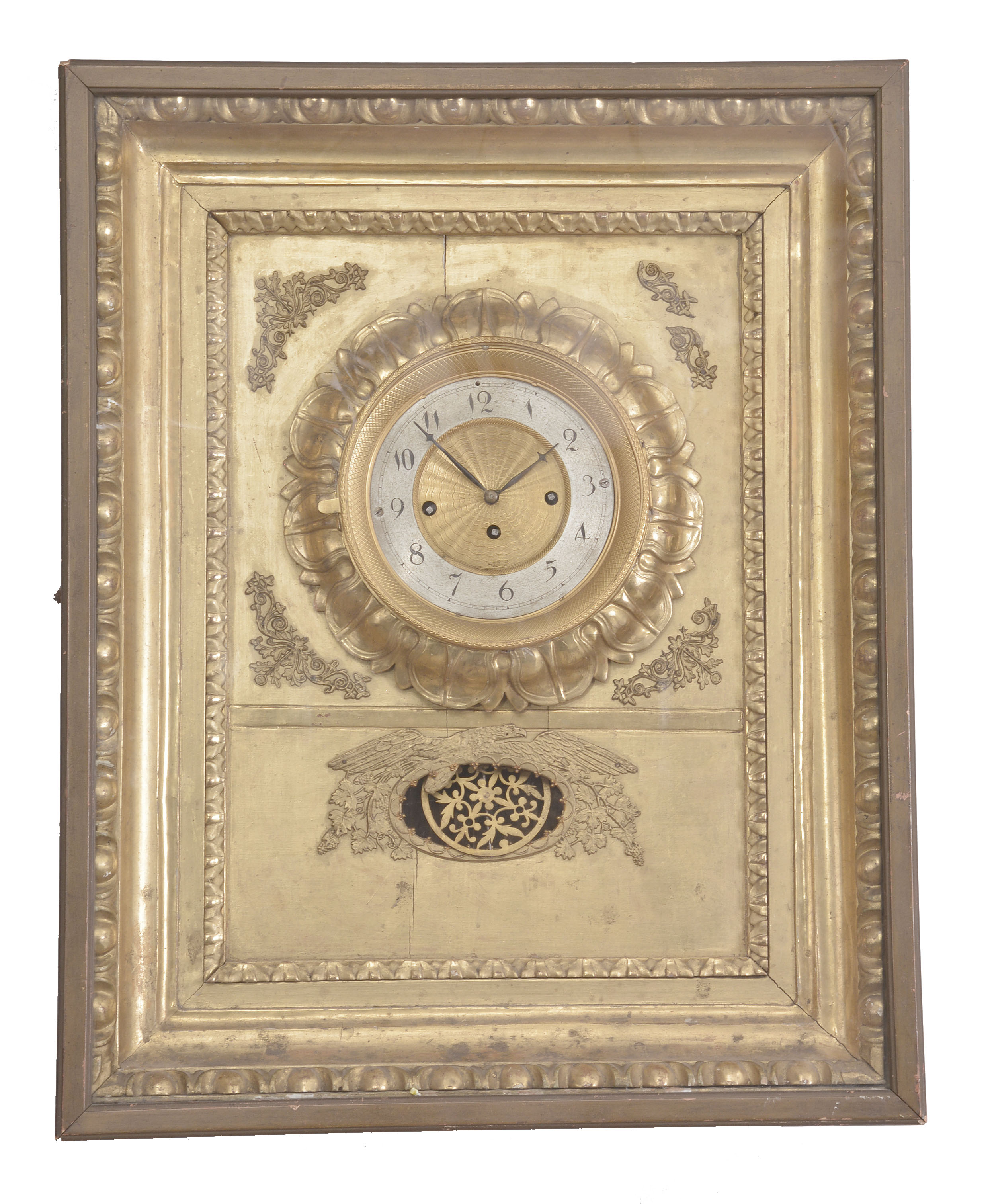 Austria, picture frame wall clock, 2 day, time and grande sonnerie, three train spring driven movement with silk thread suspension in a gilded wood frame with cast appliques, brass guilloche dial, and silvered chapter ring. — Antique Clocks Price Guide