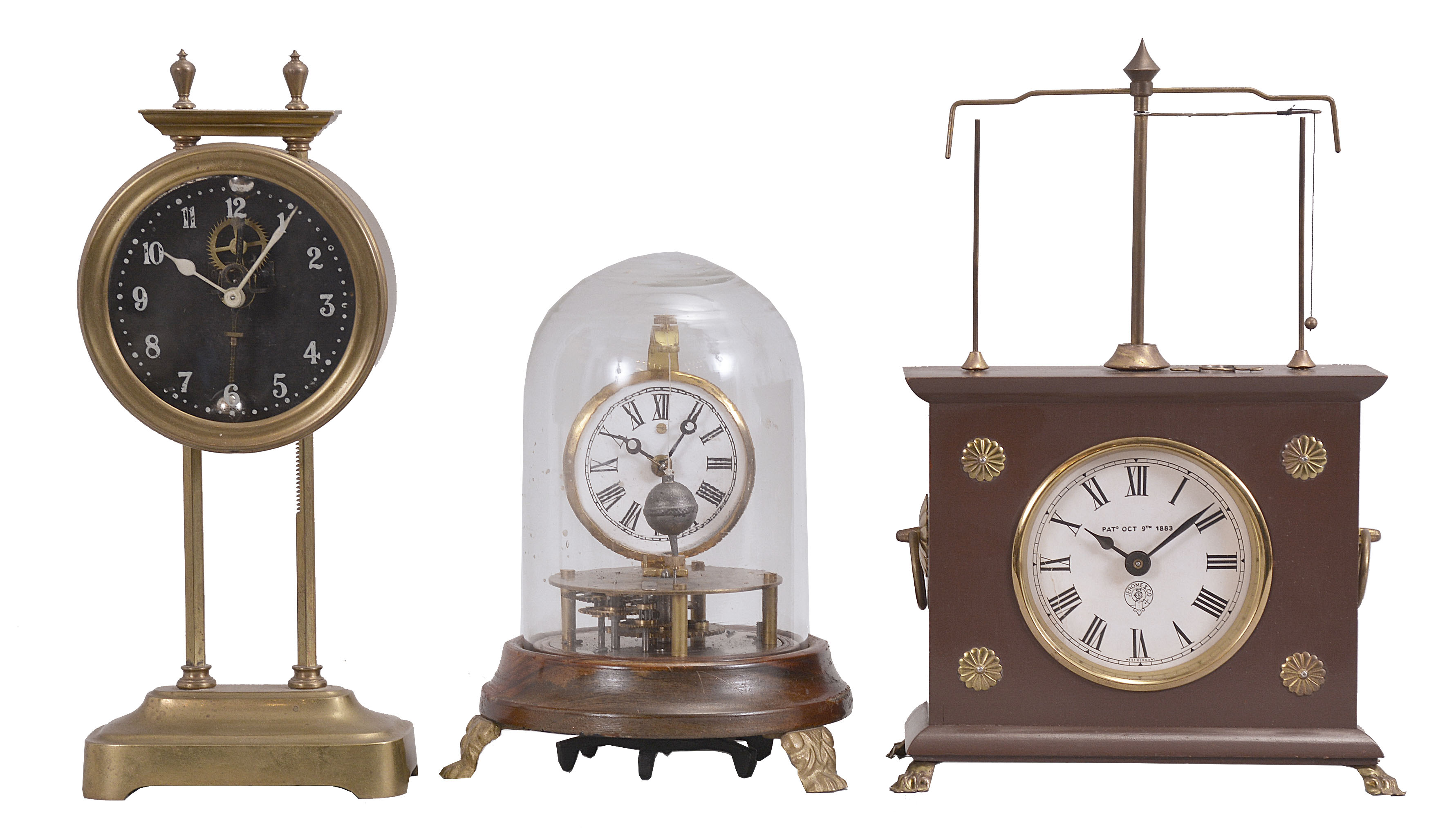 Clocks- 3 (Three): (1) France, gravity clock, 30 hour, time only, weight driven movement with compound barbell pendulum in a brass case with glass dial, c1925; (2) Briggs rotary pendulum novelty clock reproduction, 30 hour, spring driven movement with conical pendulum on a wood stand under a glass dome, c1980; (3) Horolovar Clock Co., Bronxville, New York reproduction "Ignatz Flying Pendulum" novelty clock, 30 hour, time only, in a brown wood case, c1975. — Antique Clocks Price Guide