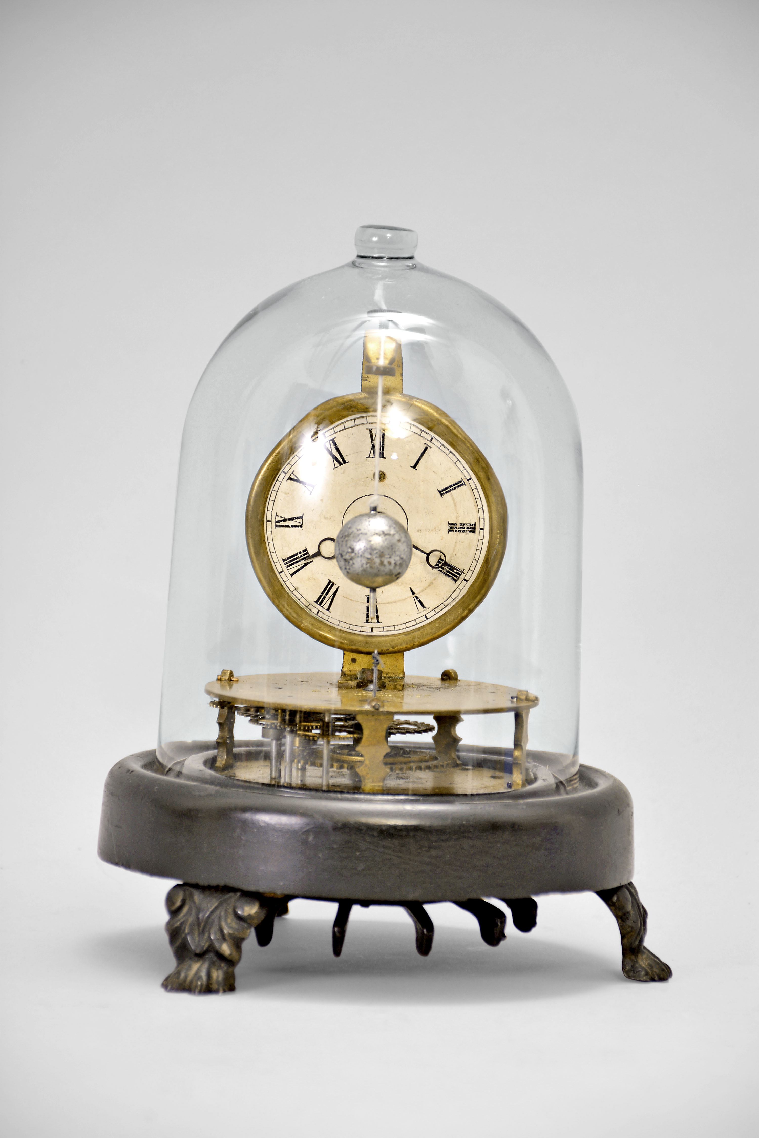 George W. Brown &amp; Co., Forestville, Conn., "Briggs Rotary", 30 hour, spring brass movement rotary pendulum novelty timepiece. — Antique Clocks Price Guide