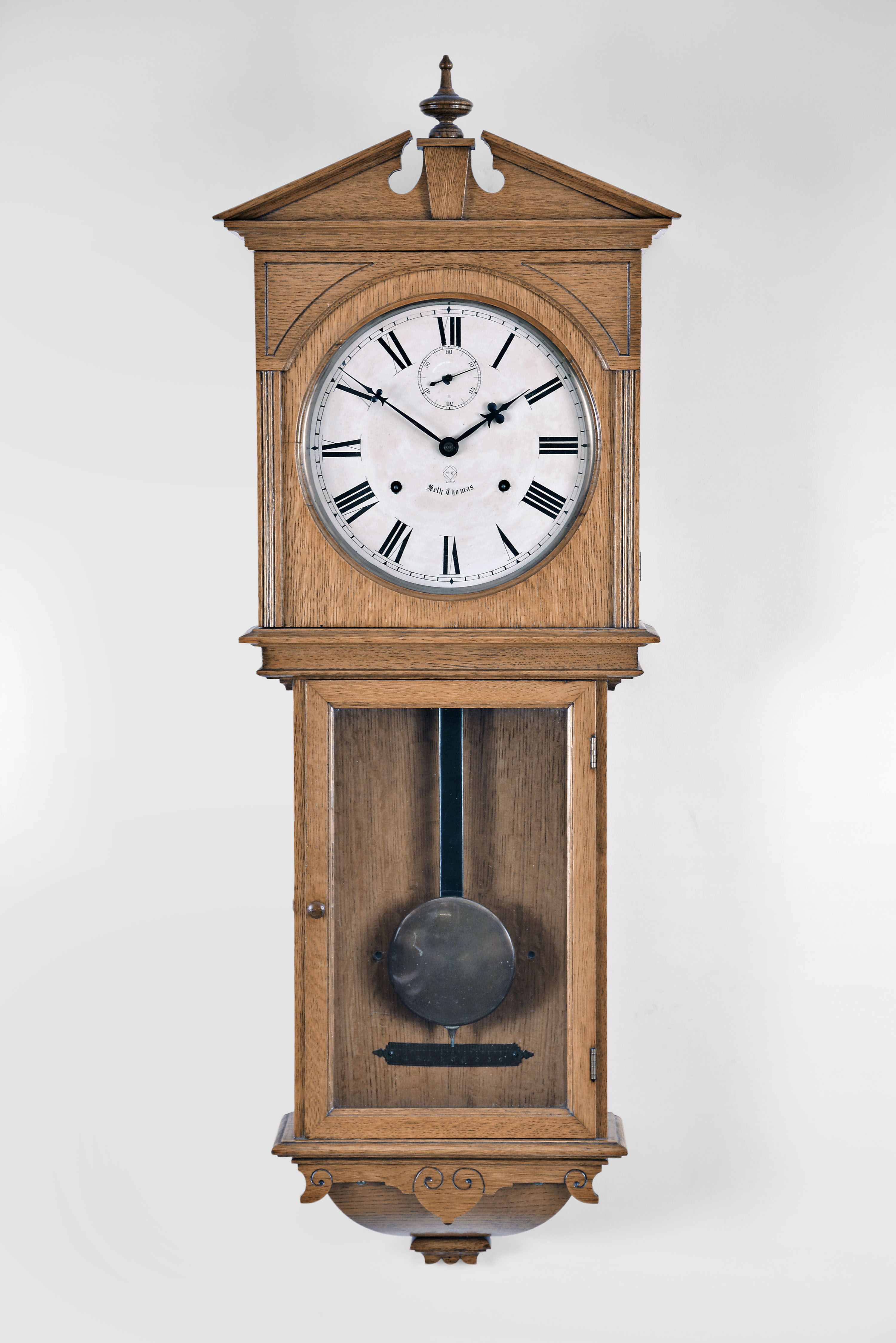 Seth Thomas Clock Co., Thomaston, Conn, "Umbria" wall hanging clock with a double spring driven 15 day timepiece movement in an oak case. — Antique Clocks Price Guide