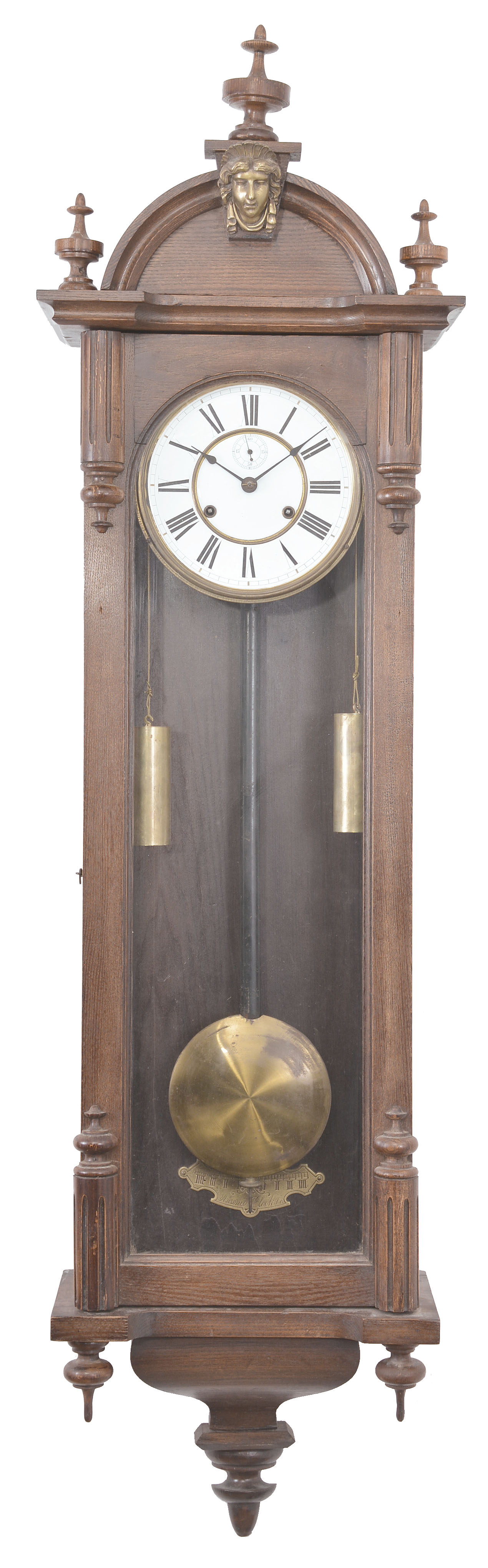 Ansonia Clock Co., New York, "Capitol" hanging timepiece, 8 day, time only, dual weight driven movement in a Vienna-style walnut case with white enamel dial with subsidiary seconds. — Antique Clocks Price Guide