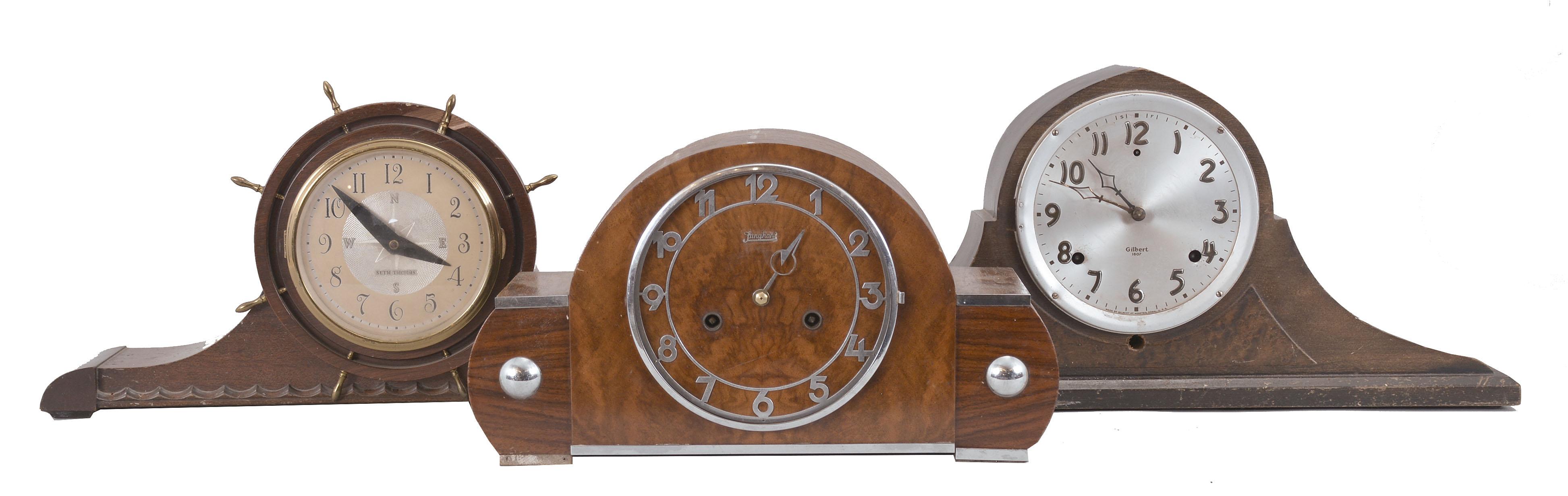 Clocks- 9 (Nine): Assorted spring-driven and electric mantel clocks by makers including Seth Thomas, Gilbert, and Junghans. — Antique Clocks Price Guide