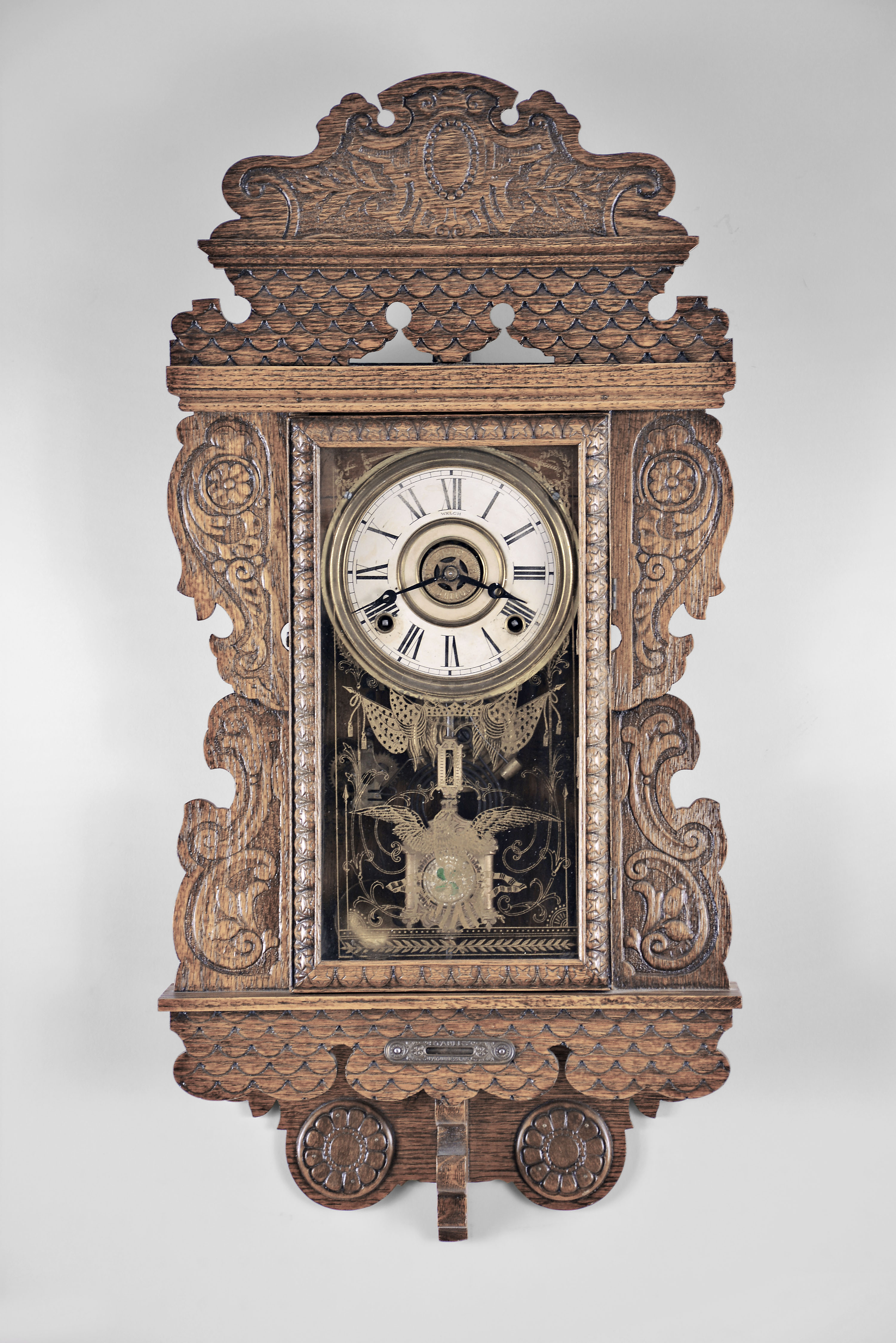 E. N. Welch Mfg. Co., "Eureka", 8 day, time, strike and alarm spring brass movement wall clock. This model appears in the catalog as "Unknown No. 15 " — Antique Clocks Price Guide