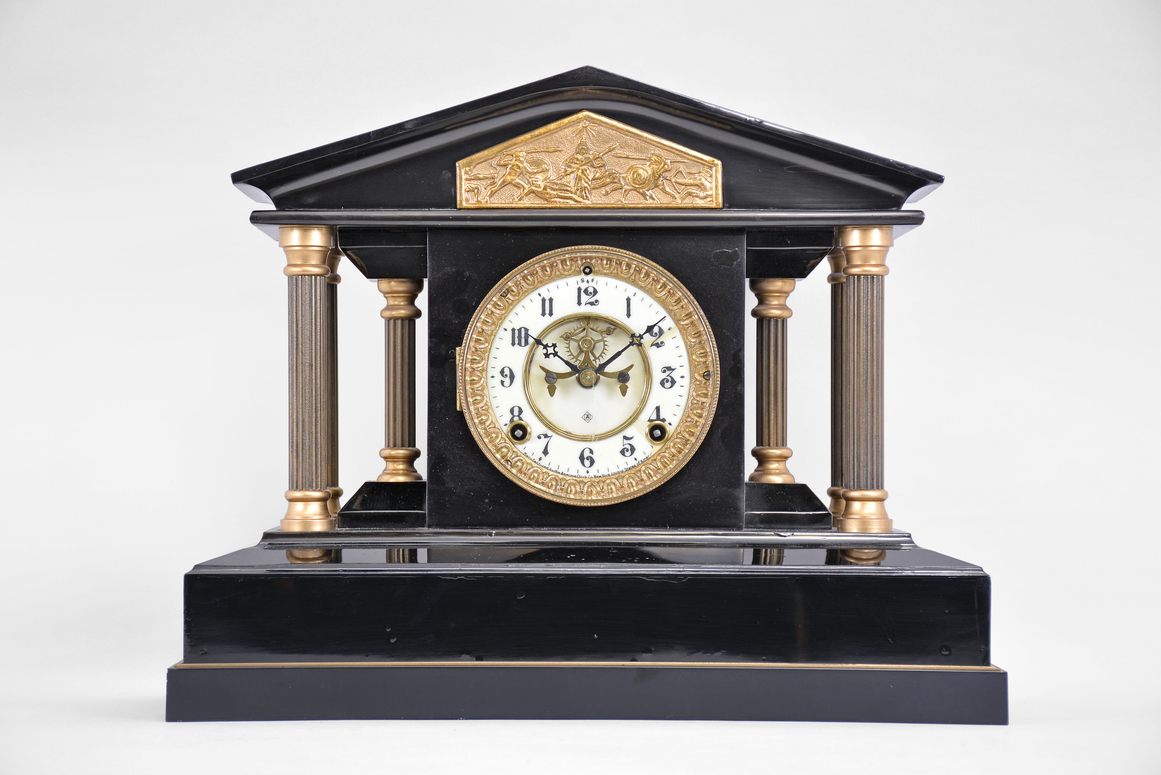Ansonia Clock Co., New York, "Loire", 8 day, time and strike spring brass movement enameled iron case mantel clock. — Antique Clocks Price Guide