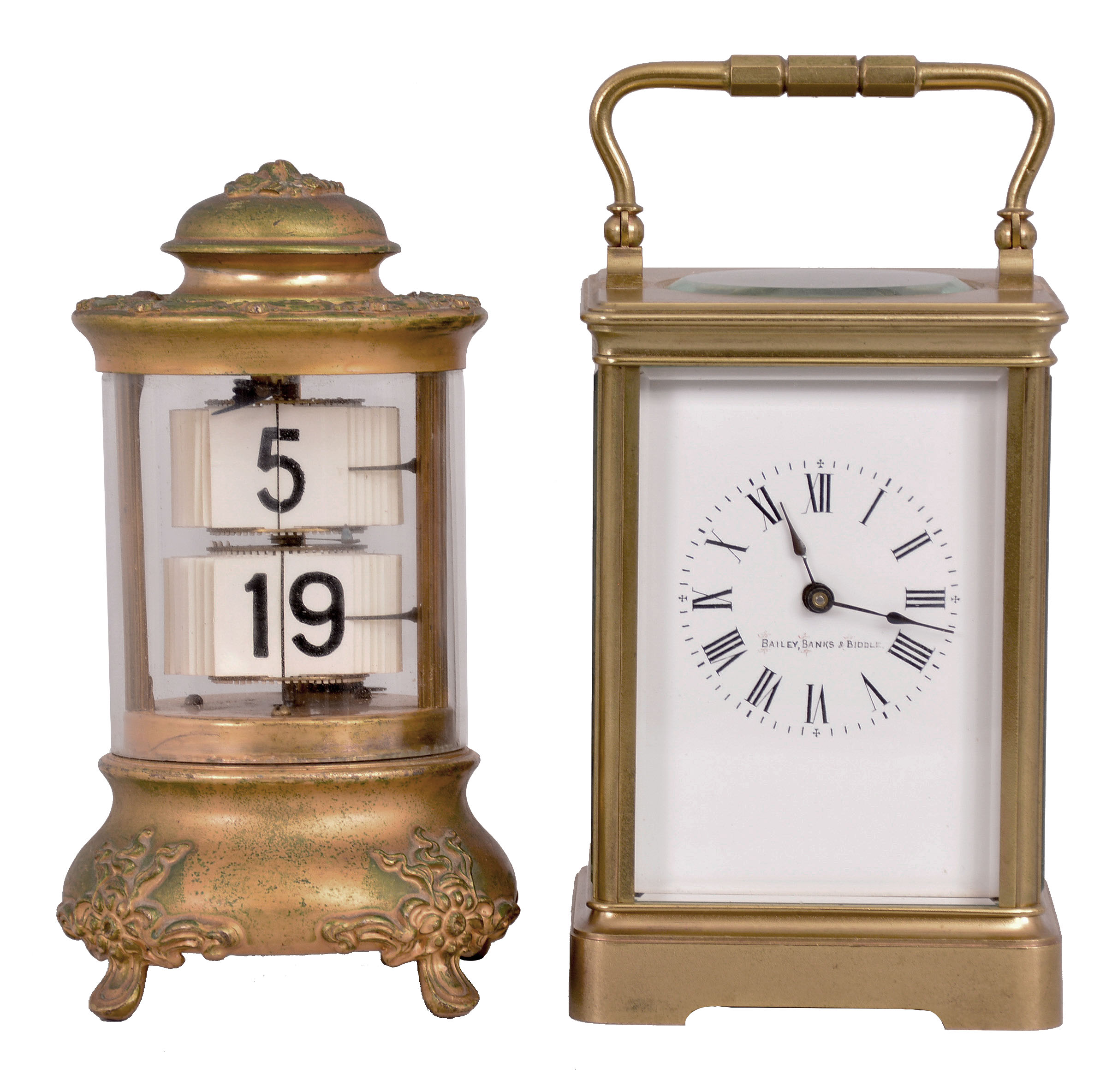 Clocks- 2 (Two): (1) Ansonia Clock Co., New York, "Design No. 4" Plato timepiece, 30 hour, time only, spring driven balance wheel movement in a cylindrical brass and glass case with digital flip-card time display, c1907; (2) Boston Clock Co., Boston, Mass. for Bailey Banks, &amp; Biddle, carriage clock, 8 day, time and strike, tandem-wind spring driven balance wheel movement in a glazed brass case, c1890. — Antique Clocks Price Guide