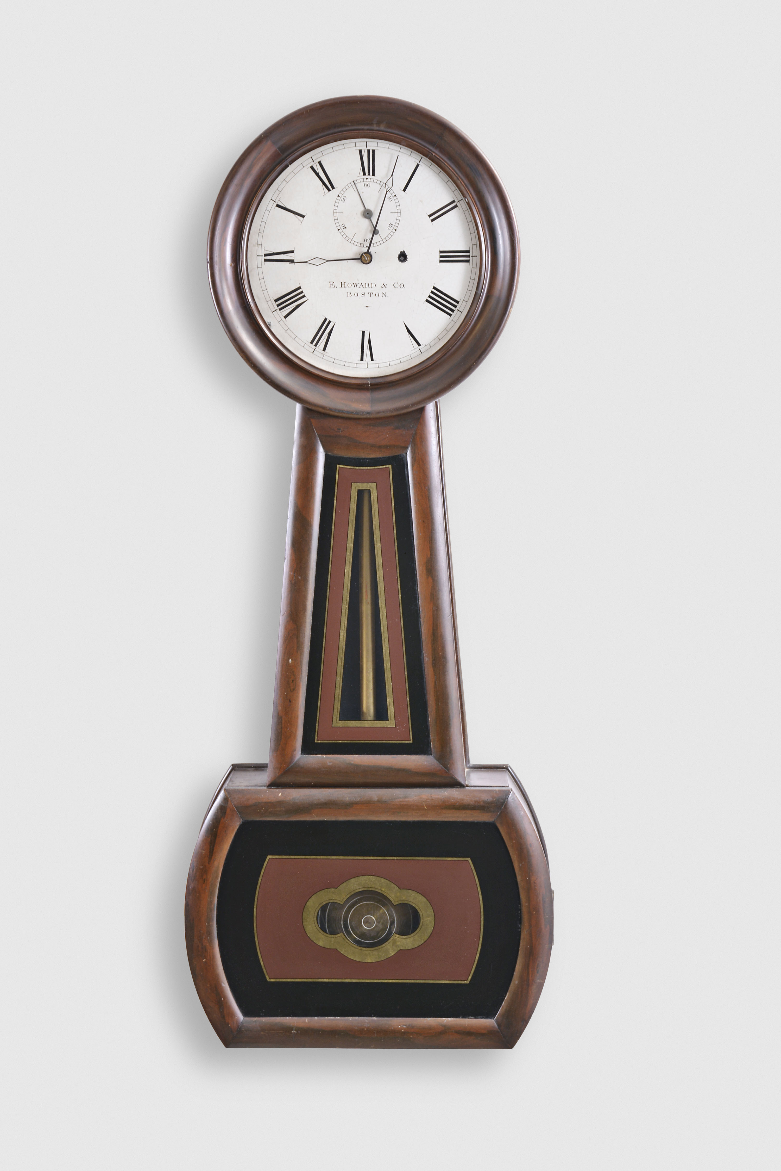 E. Howard &amp; Co., Boston, Mass., "No. 1 Regulator" banjo wall clock, 8 day, time only, weight driven movement in a rosewood grained cherry case with painted metal dial and reverse painted throat and lower tablets — Antique Clocks Price Guide