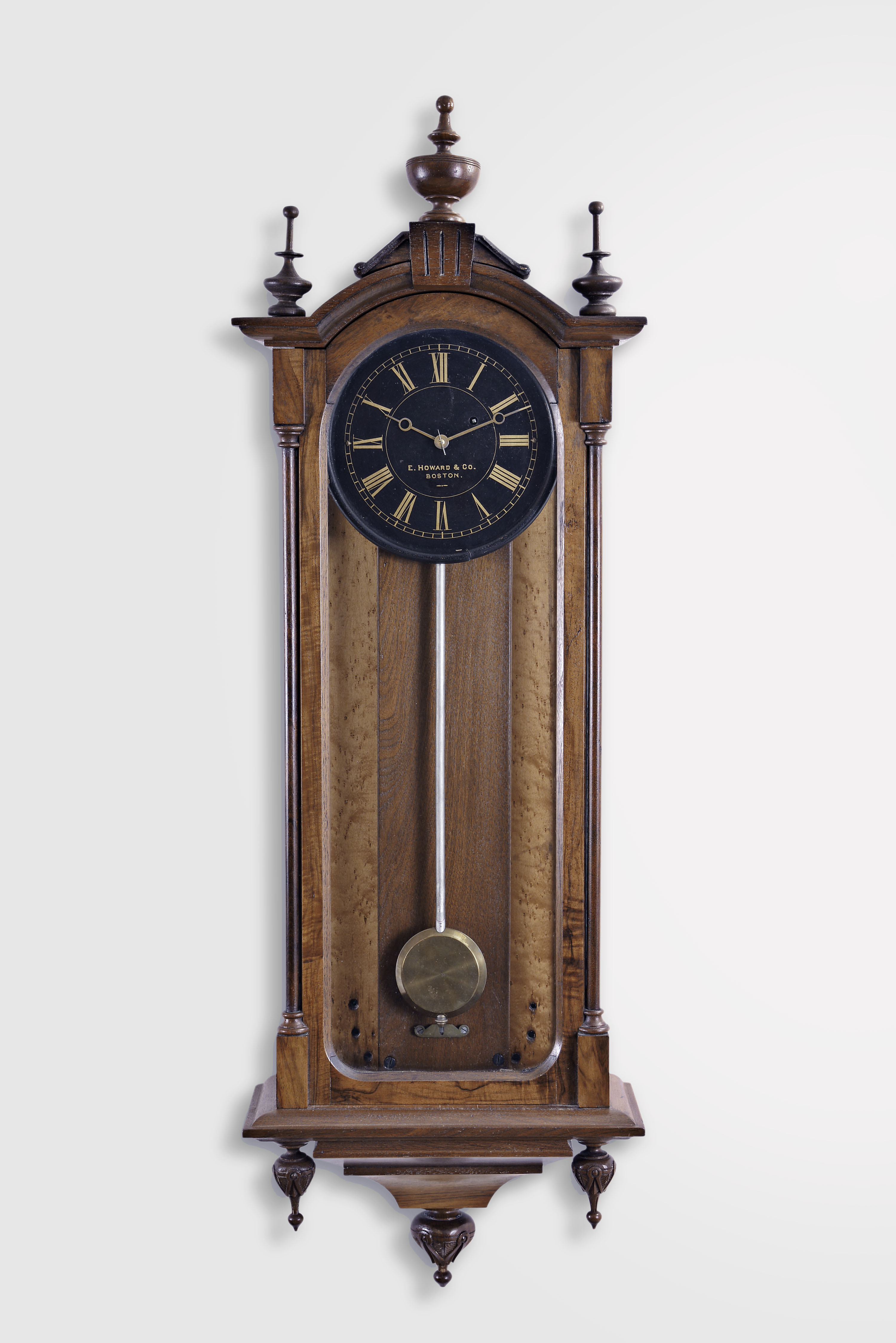 E. Howard &amp; Co., Boston, Mass., "No. 59-8 Regulator" wall clock, 8 day, time only, weight driven movement in a mahogany case with maple backboard and a black painted iron dial with gold numerals and hands — Antique Clocks Price Guide