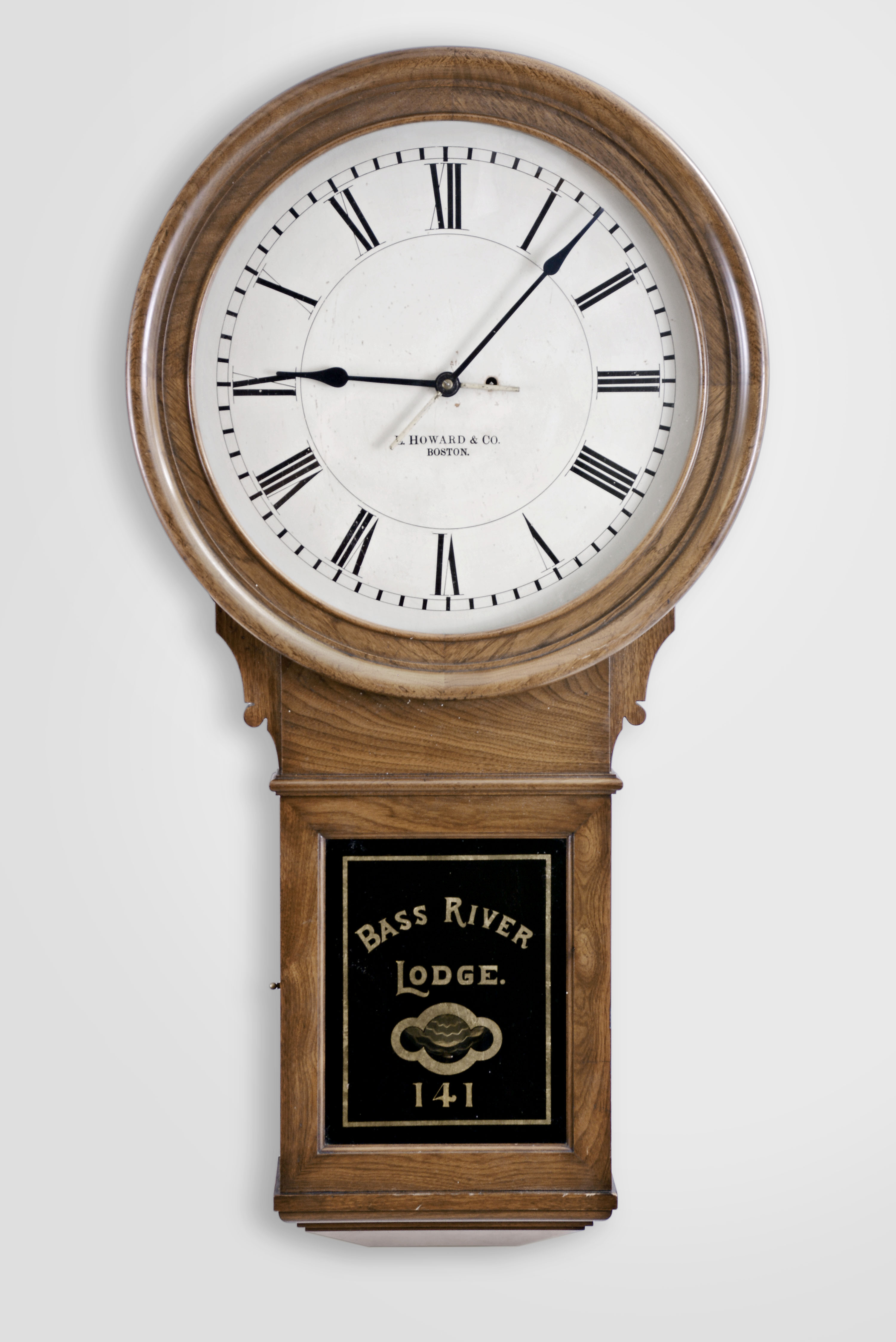 E. Howard &amp; Co., Boston, Mass., "No. 70 Regulator - 20 Inch Dial", wall clock, 8 days, time only, weight driven movement in a walnut case with painted wooden dial and reverse painted lower tablet for "BASS RIVER LODGE 141" — Antique Clocks Price Guide